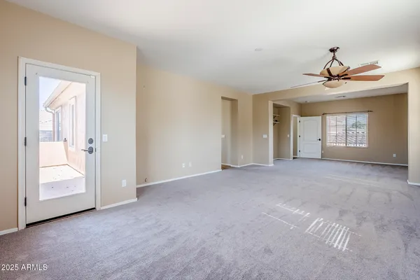 a large bathroom with a large tub sink and double vanity