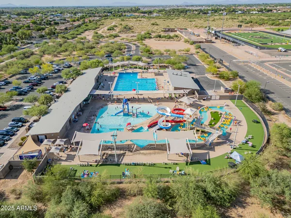 an aerial view of house with yard