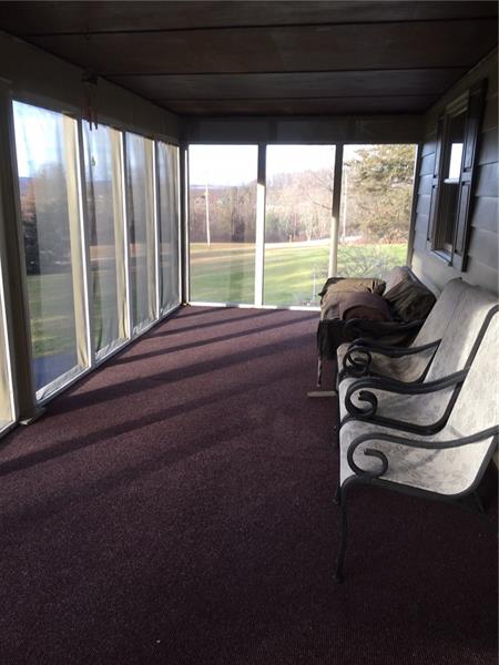 152 McKean Road Freeport, PA 16229 - Photo 15 of 23 Double doors from dining room lead to this screened in porch