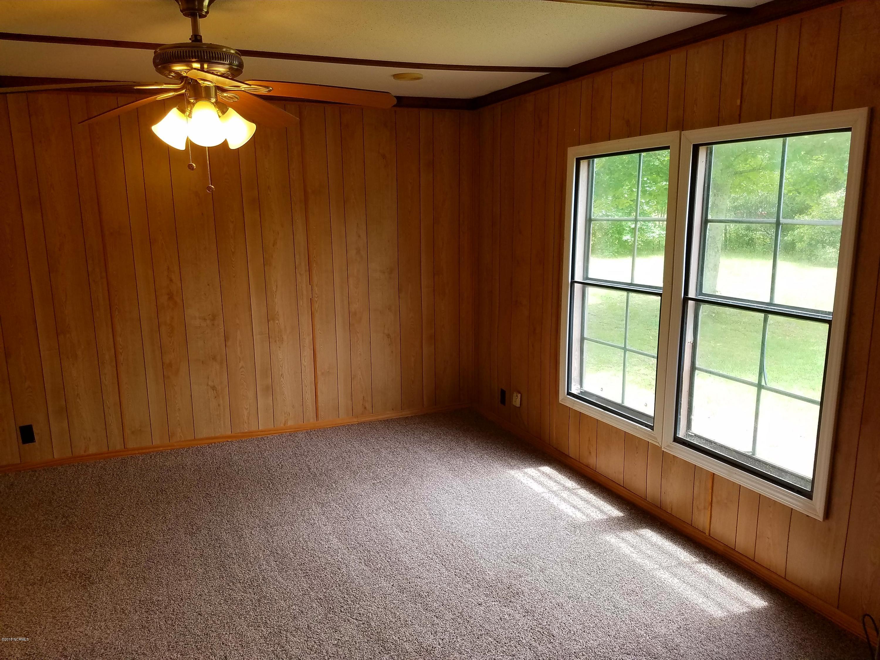 501 East Henry Street Atkinson, NC 28421 - Photo 21 of 34 master bedroom