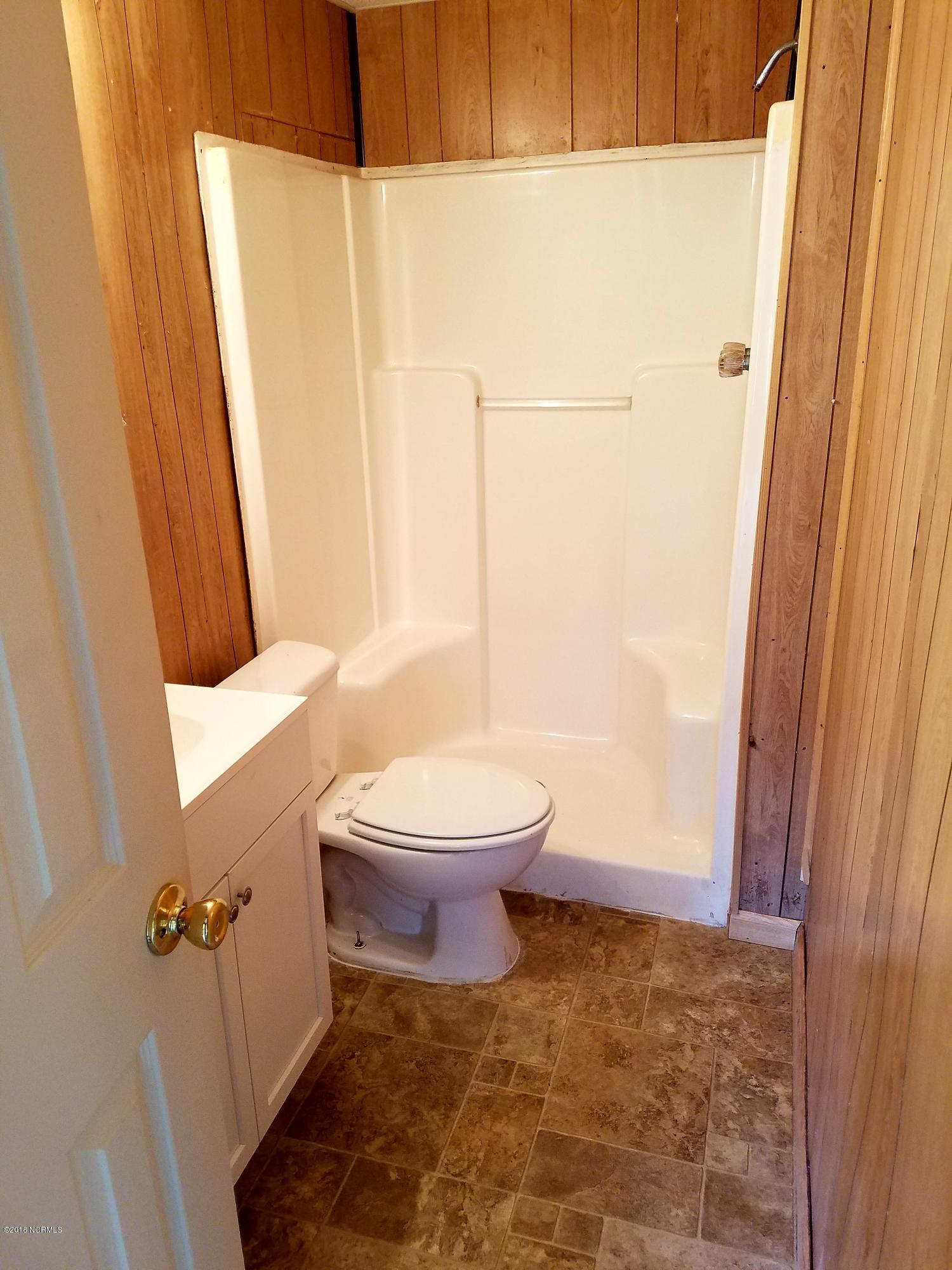501 East Henry Street Atkinson, NC 28421 - Photo 24 of 34 bathroom 1