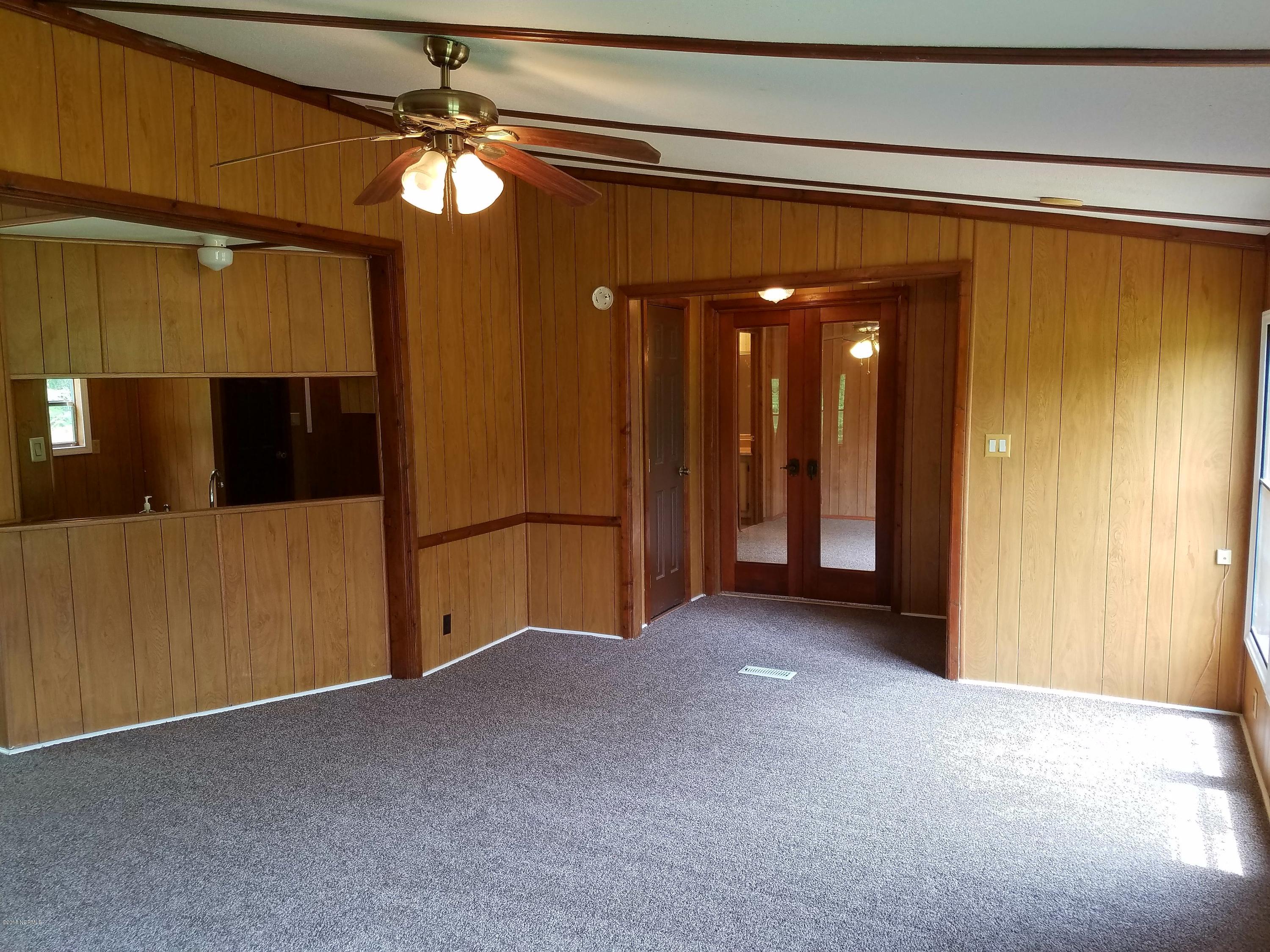 501 East Henry Street Atkinson, NC 28421 - Photo 8 of 34 living room 2