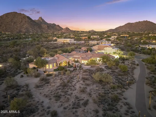 a view of a street with couches