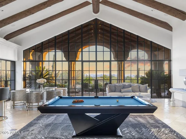 a kitchen with granite countertop a sink and a stove