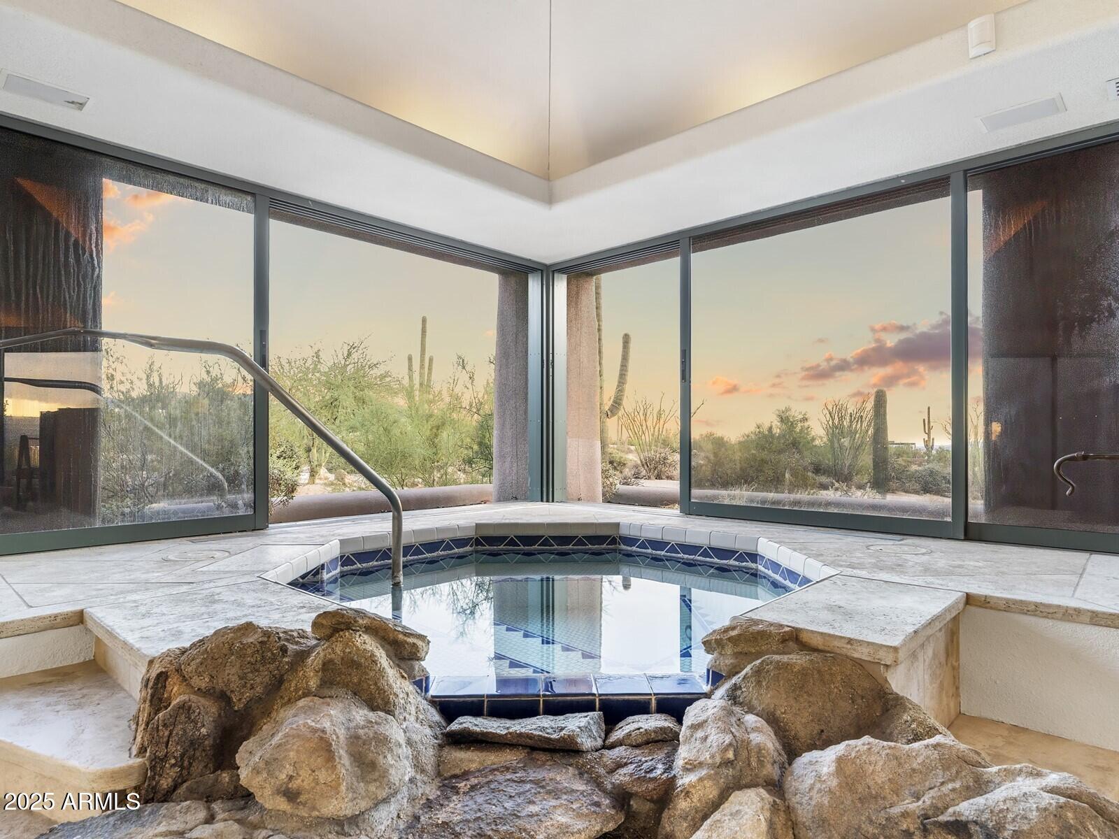 9422 East Happy Valley Road Scottsdale, AZ 85255 - Photo 58 of 78 Spa w Floor To Ceiling Glass