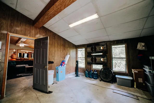 a view of a garage with furniture and a garage