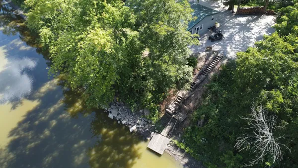 a view of a lake with sitting area