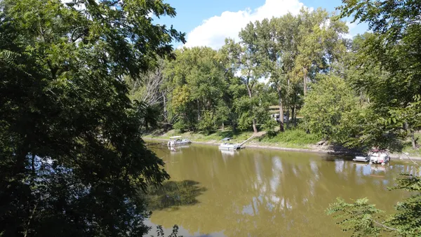 a view of a house with a yard fountain
