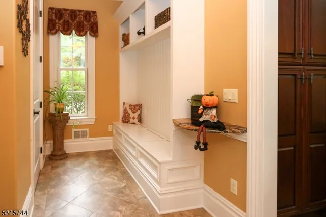 a room with a window and a table