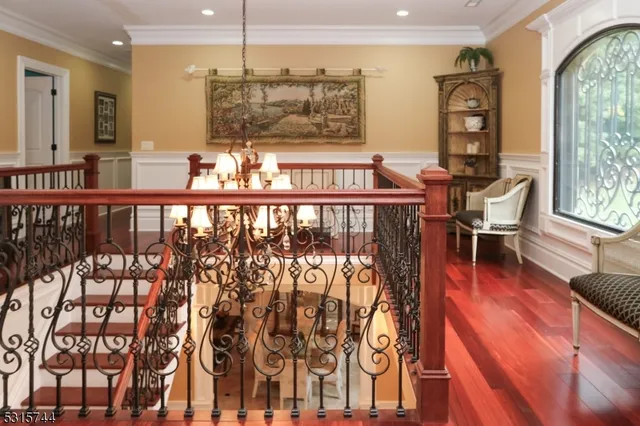 a dining room with furniture wooden floor and windows