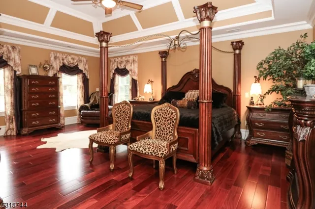a view of a livingroom with furniture and hardwood floor