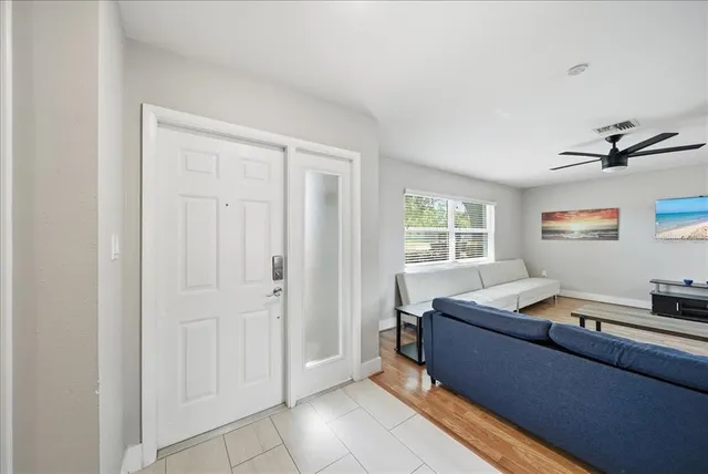 a room with furniture and window