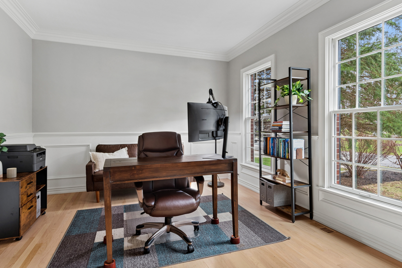 39W553 Sheldon Lane Geneva, IL 60134 - Photo 15 of 46 a view of a workspace with furniture and a window