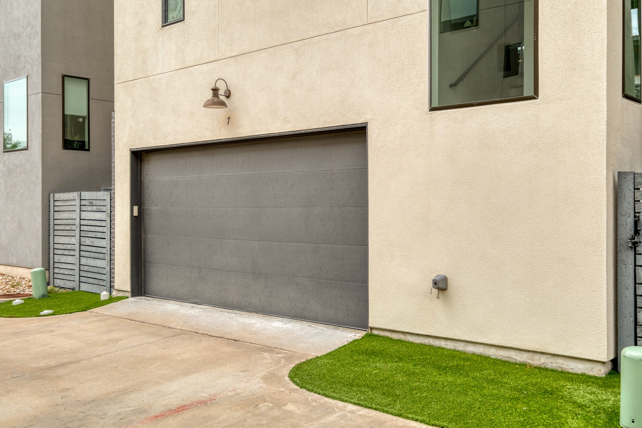 5002 Pecan Springs Road, Unit 7 Austin, TX 78723 - Photo 29 of 34 The attached garage provides secure parking and additional storage for bikes or outdoor gear