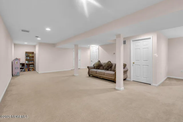 a view of a balcony with wooden floor