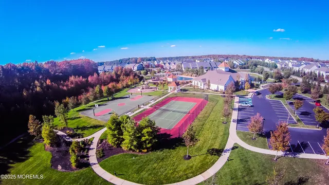 a view of a swimming pool with chairs
