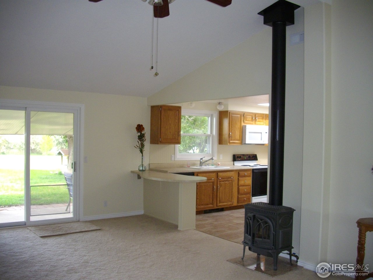 6323 Corinth Road Longmont, CO 80503 - Photo 3 of 23 Freestanding gas stove in living room
