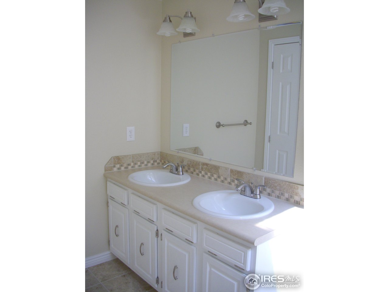 6323 Corinth Road Longmont, CO 80503 - Photo 4 of 23 Two sinks in master bath
