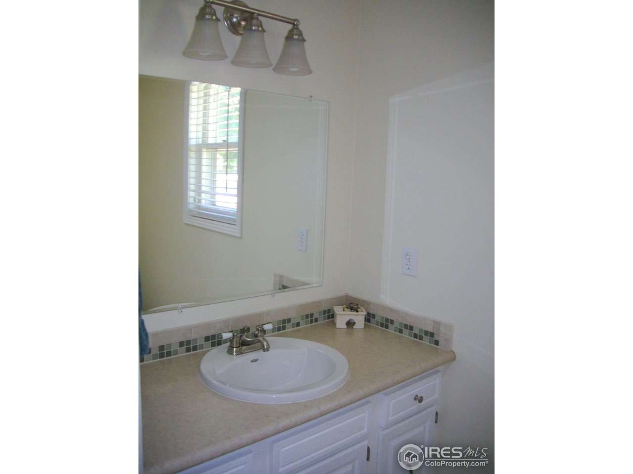 6323 Corinth Road Longmont, CO 80503 - Photo 7 of 23 2nd bathroom sink