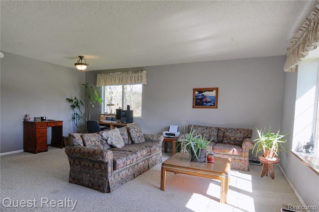 10395 Fish Lake Road Holly, MI 48442 - Photo 24 of 42 Living_Room_2nd_View.jpg