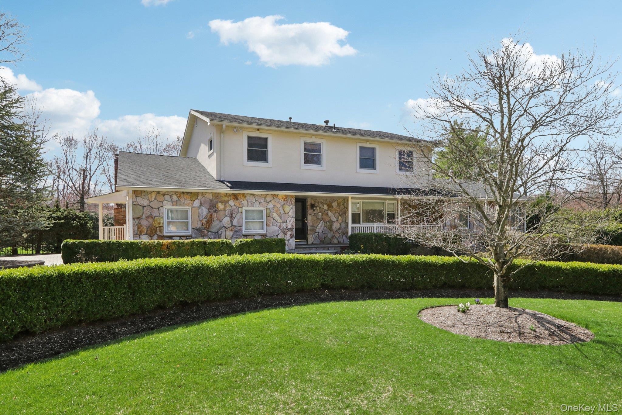 17 Rolling Ridge Road New City, NY 10956 - Photo 1 of 50 a front view of a house with a garden