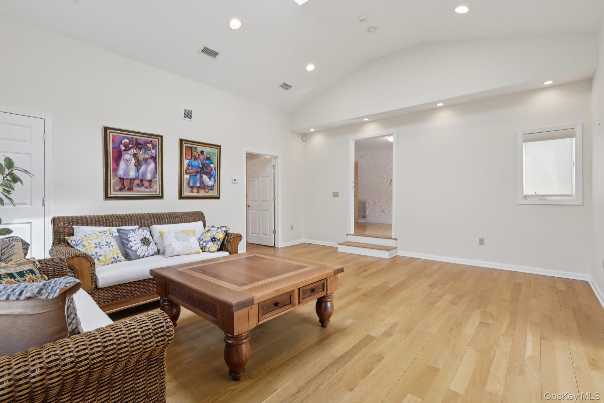 17 Rolling Ridge Road New City, NY 10956 - Photo 15 of 50 a living room with a couch and paintings on the wall