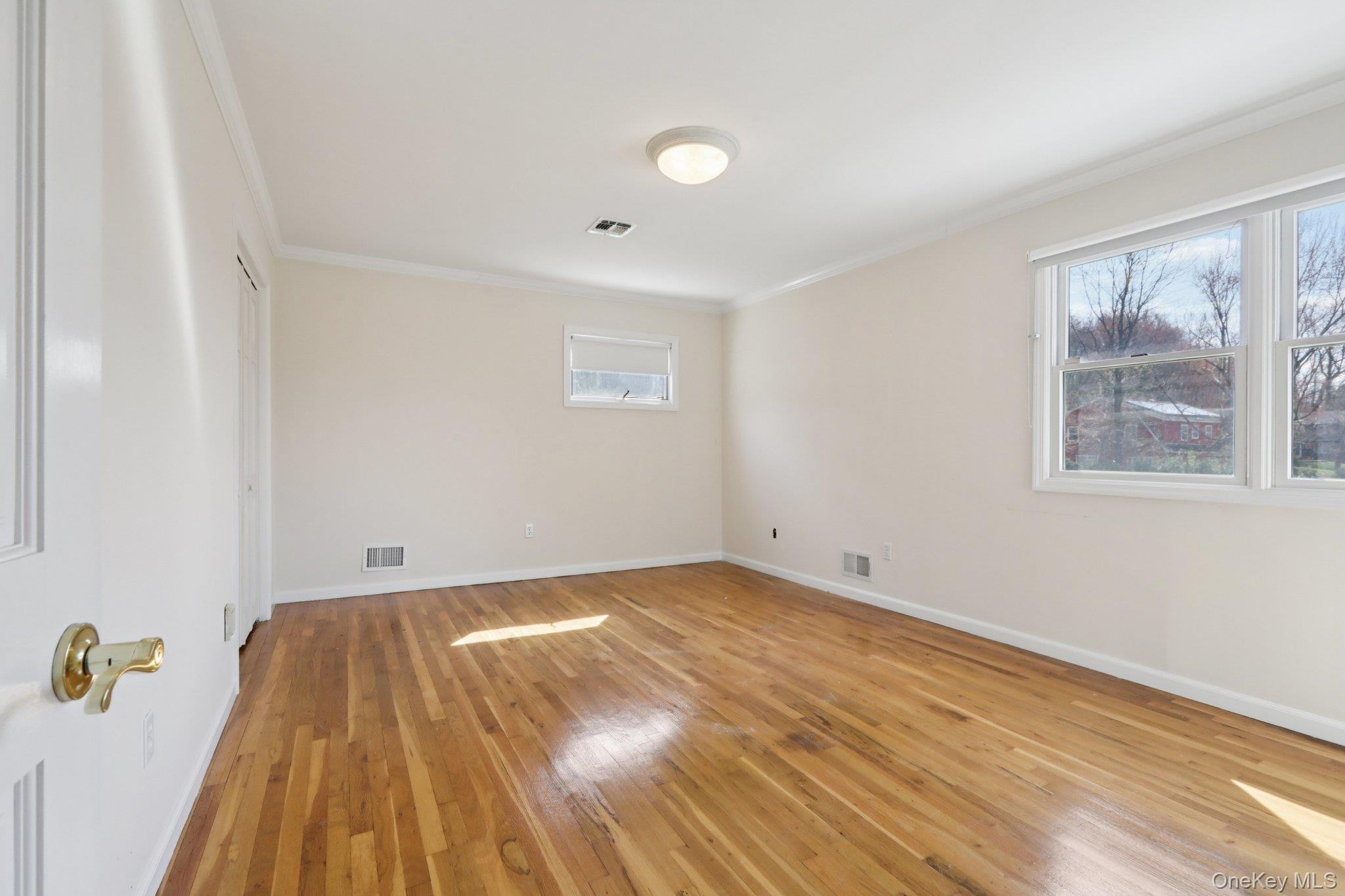 17 Rolling Ridge Road New City, NY 10956 - Photo 25 of 50 a view of empty room with wooden floor and fan