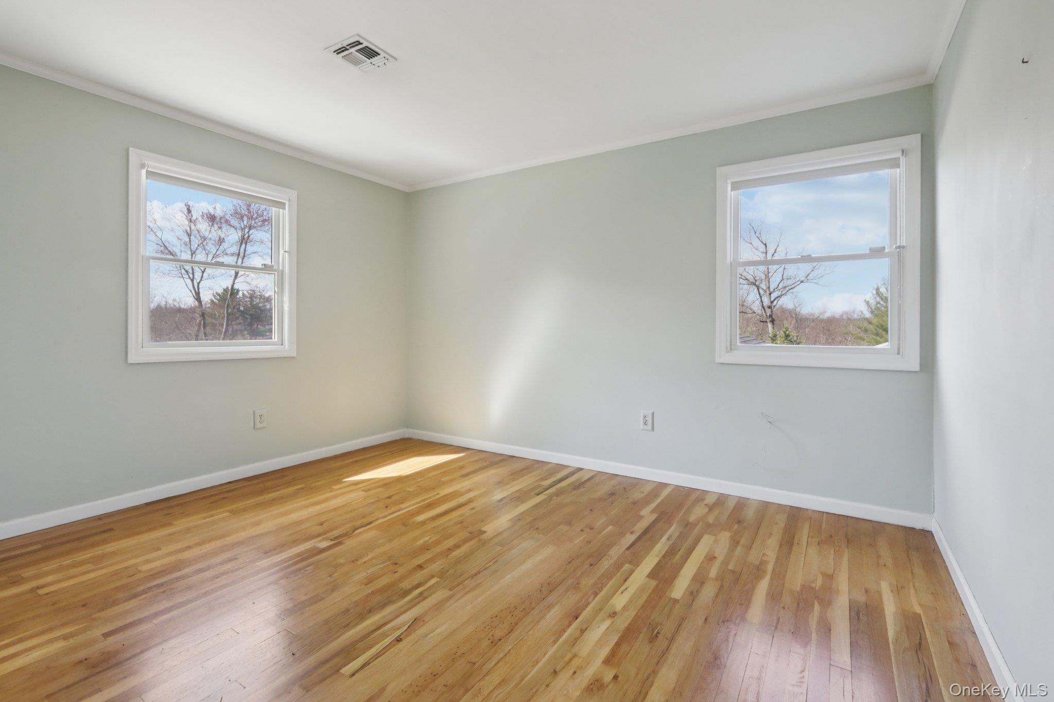 17 Rolling Ridge Road New City, NY 10956 - Photo 28 of 50 a view of an empty room with wooden floor and a window