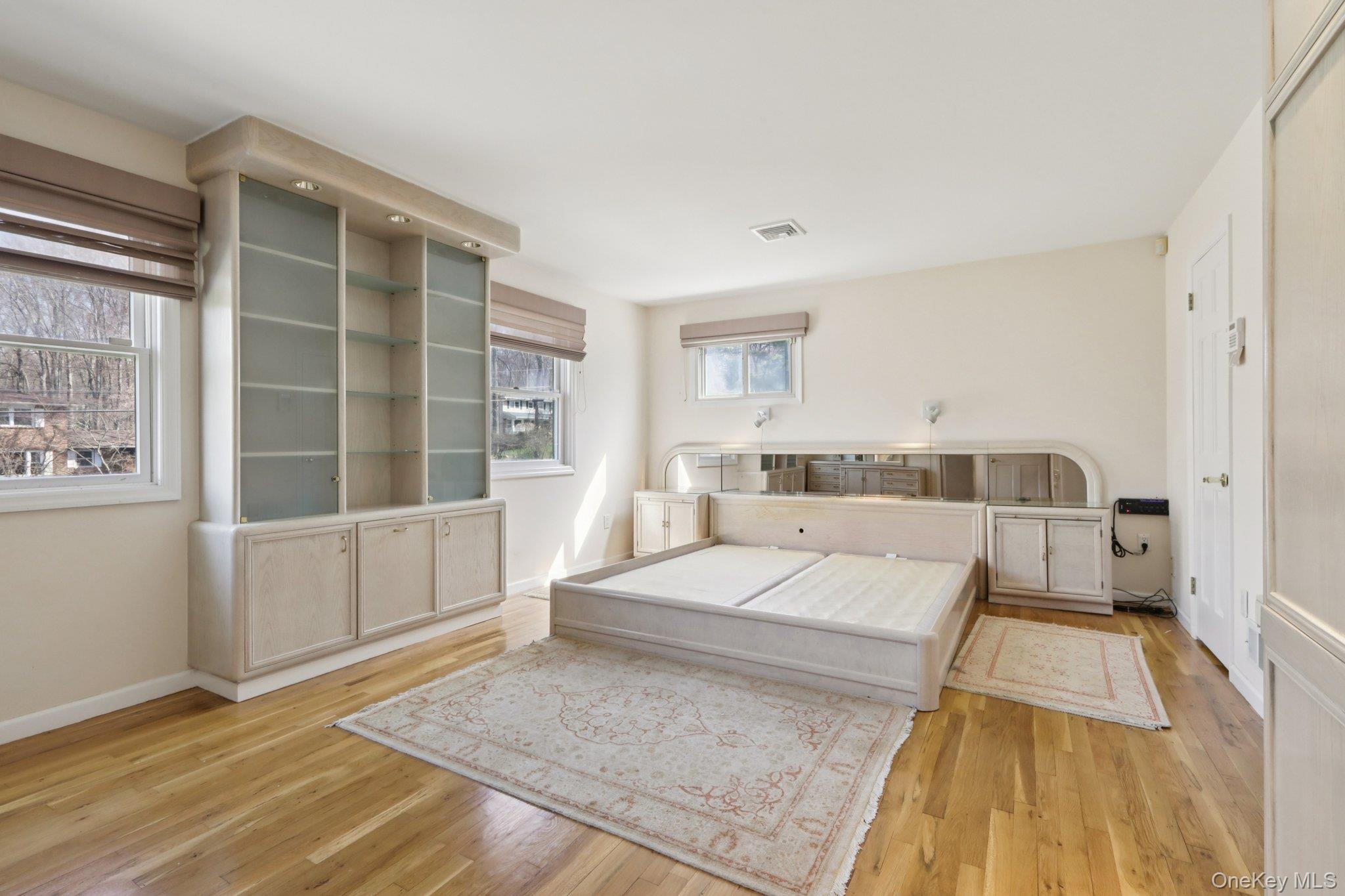 17 Rolling Ridge Road New City, NY 10956 - Photo 32 of 50 a living room with a bed and next to a window