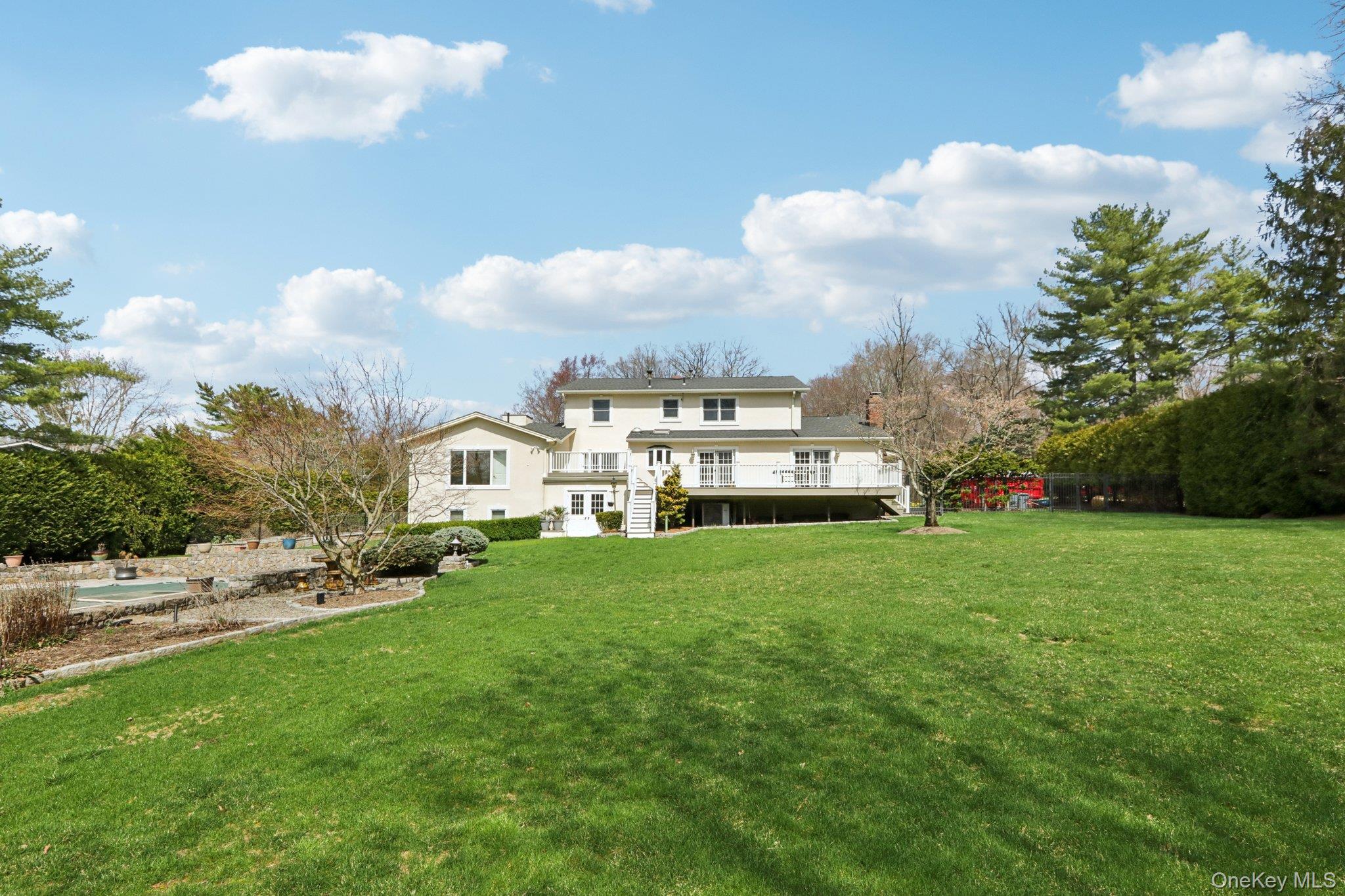 17 Rolling Ridge Road New City, NY 10956 - Photo 43 of 50 a view of a house with a big yard and large trees