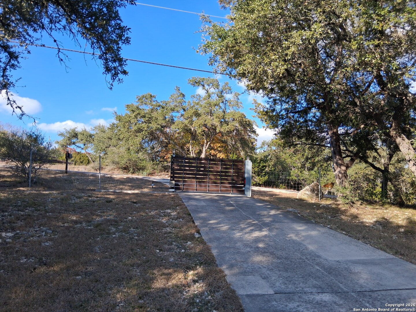 7061 Devonshire Drive Spring Branch, TX 78070 - Photo 42 of 52 a view of backyard with green space