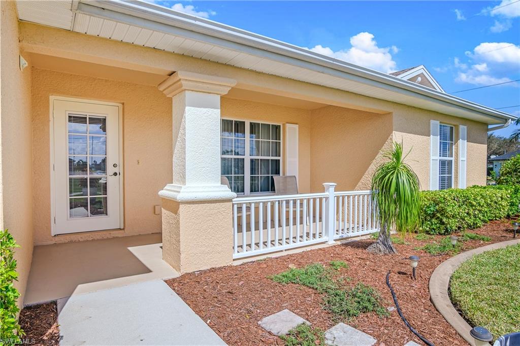 113 Northeast 29th Street Cape Coral, FL 33909 - Photo 19 of 19 a view of a house with a porch