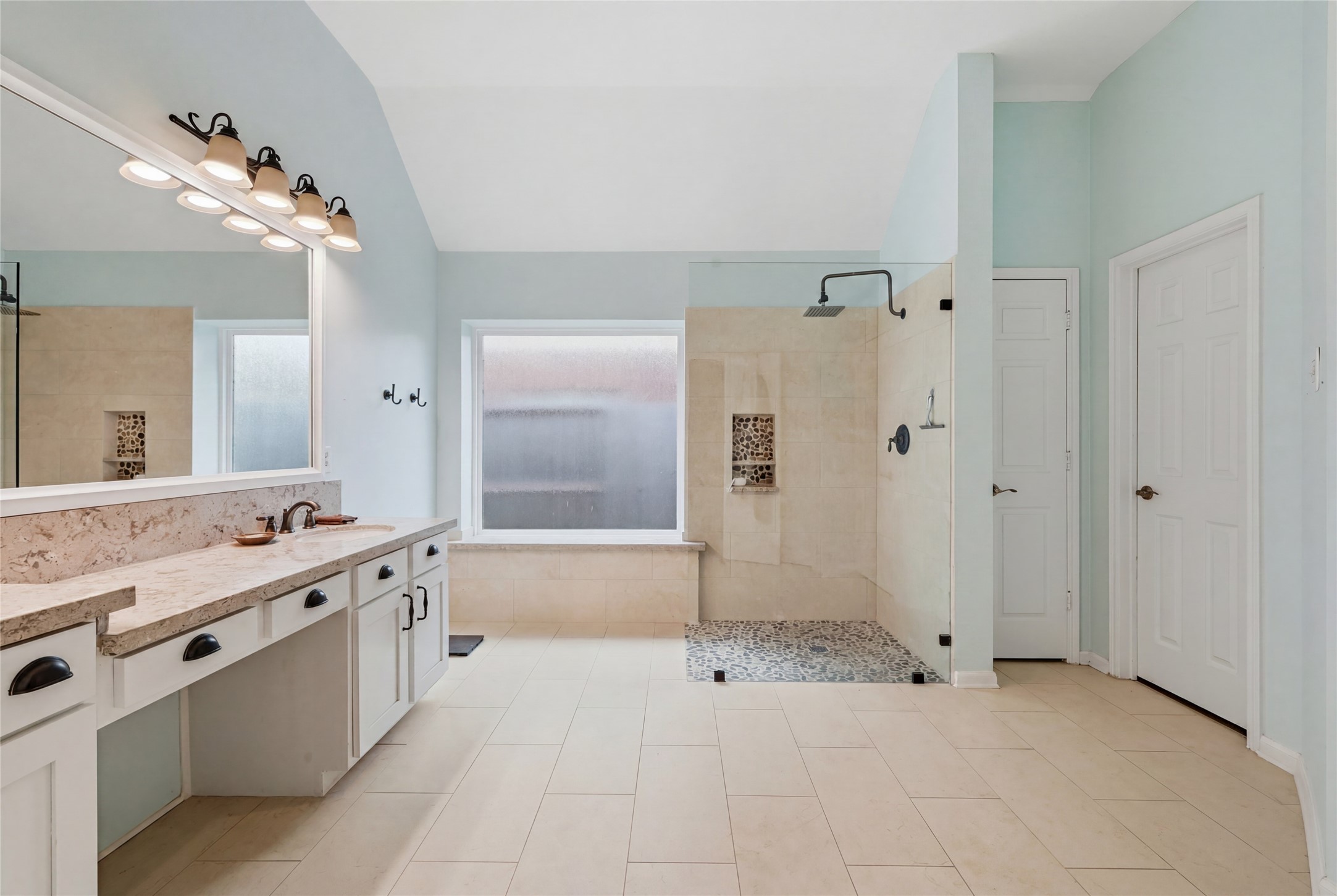 1010 Bringewood Chase Drive Spring, TX 77379 - Photo 26 of 49 Double sinks and diffused glass window gives you privacy and natural light.
