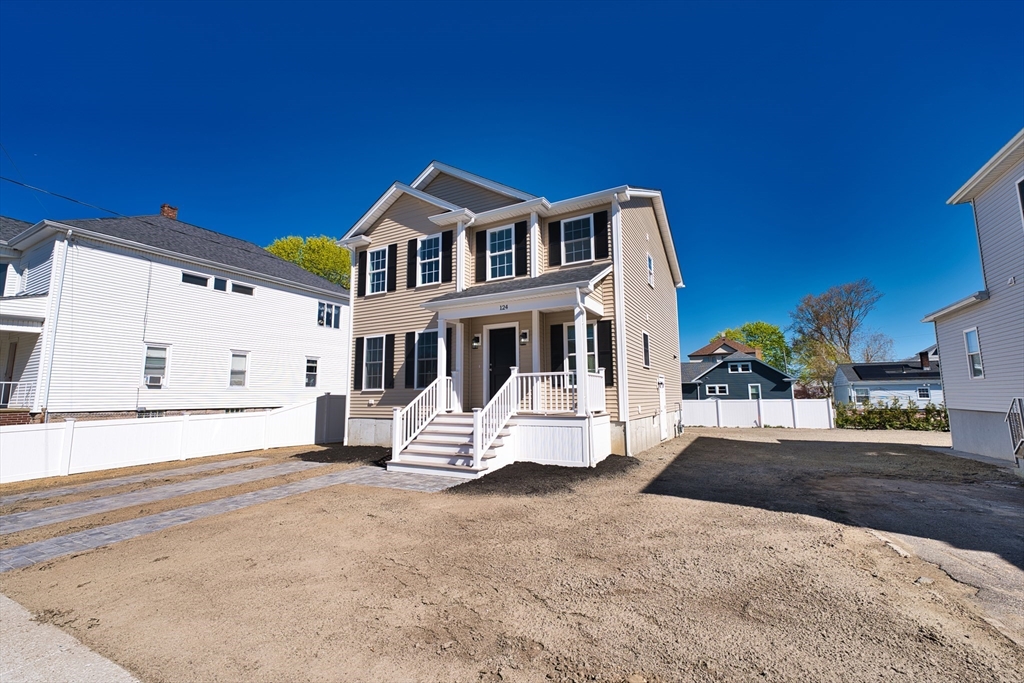 124 Downing Street Fall River, MA 02723 - Photo 2 of 33 a view of a house with a yard