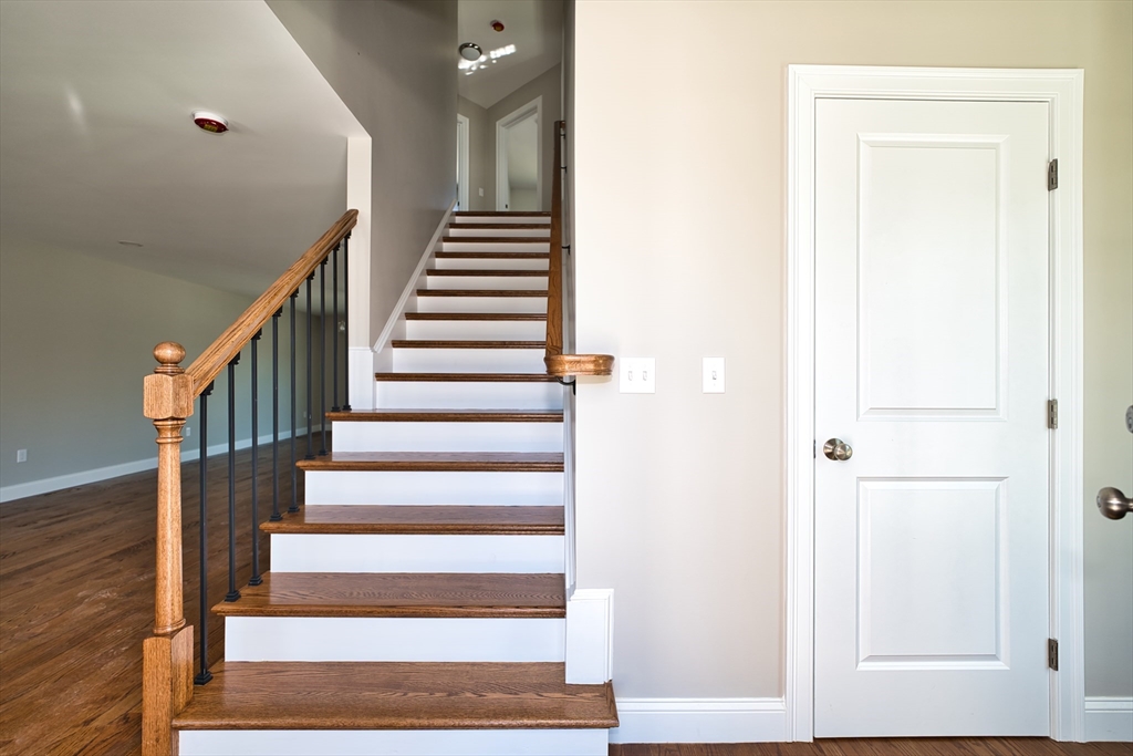 124 Downing Street Fall River, MA 02723 - Photo 5 of 33 a view of an entryway with wooden floor