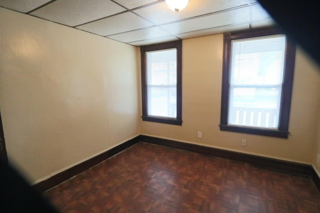 276-278 Centre Street Springfield, MA 01151 - Photo 21 of 21 an empty room with a window