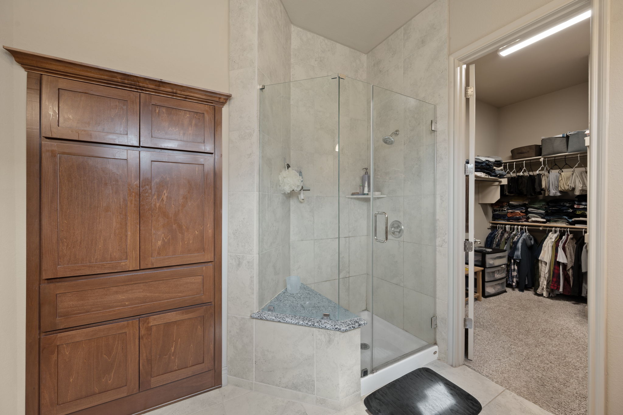 205 Clubhouse Drive, Unit G Georgetown, TX 78628 - Photo 14 of 40 a bathroom with a glass shower door
