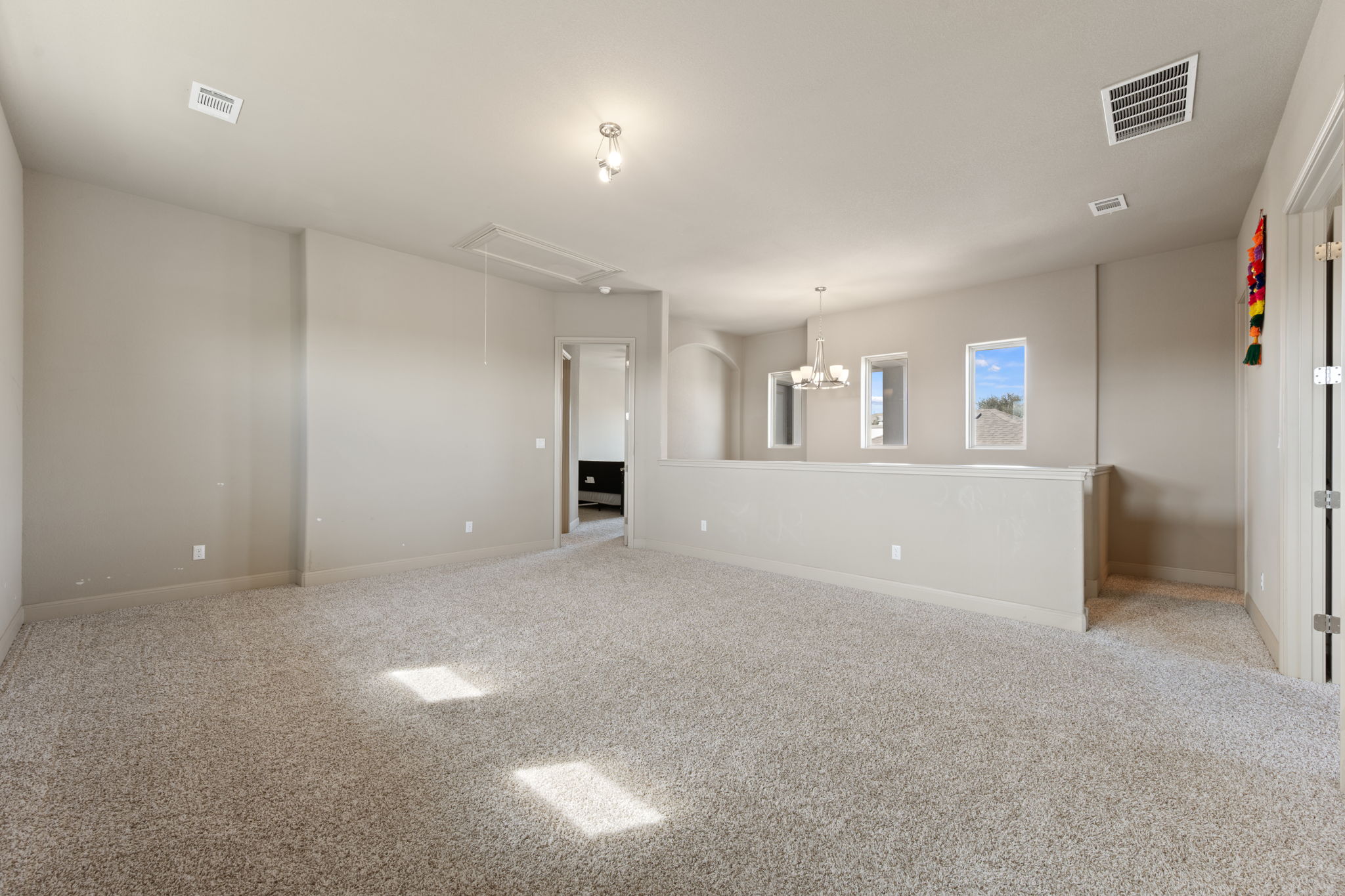 205 Clubhouse Drive, Unit G Georgetown, TX 78628 - Photo 19 of 40 an empty room with a empty space and windows