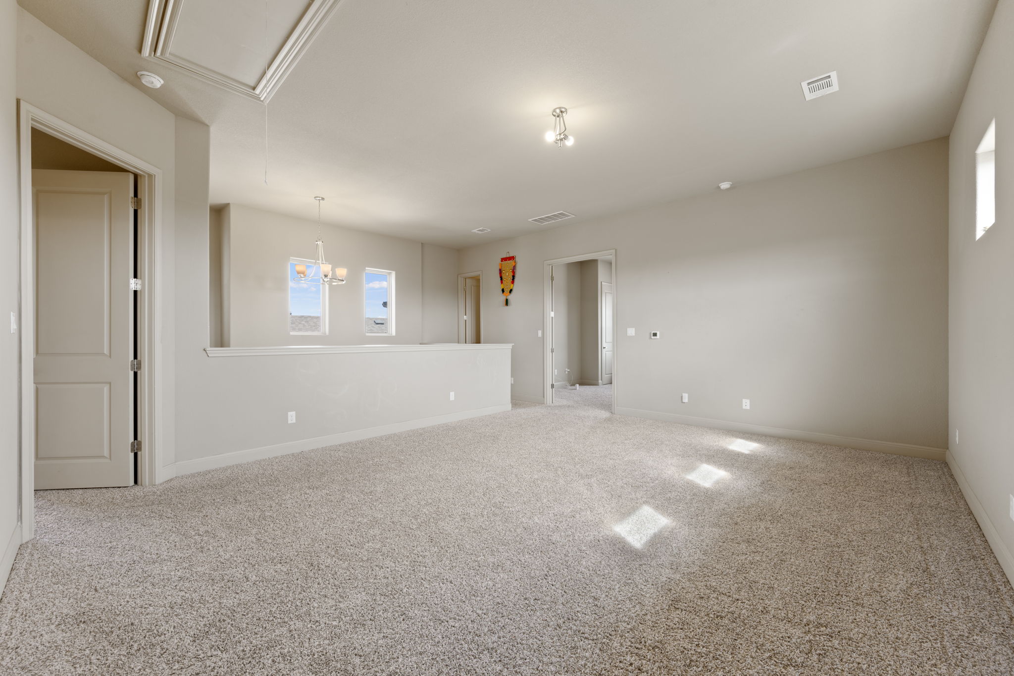 205 Clubhouse Drive, Unit G Georgetown, TX 78628 - Photo 20 of 40 an empty room with windows and closet