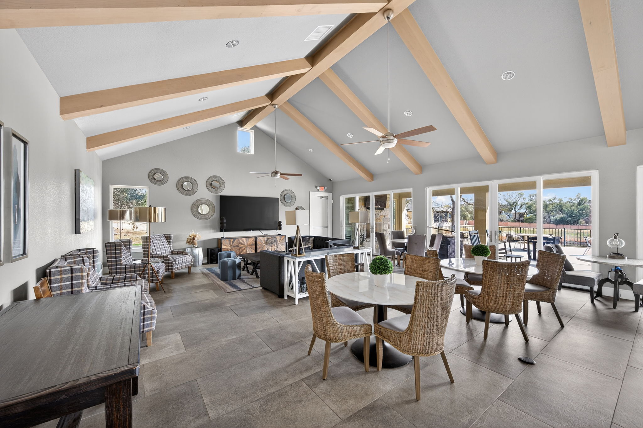 205 Clubhouse Drive, Unit G Georgetown, TX 78628 - Photo 34 of 40 a living room with lots of furniture and a large window