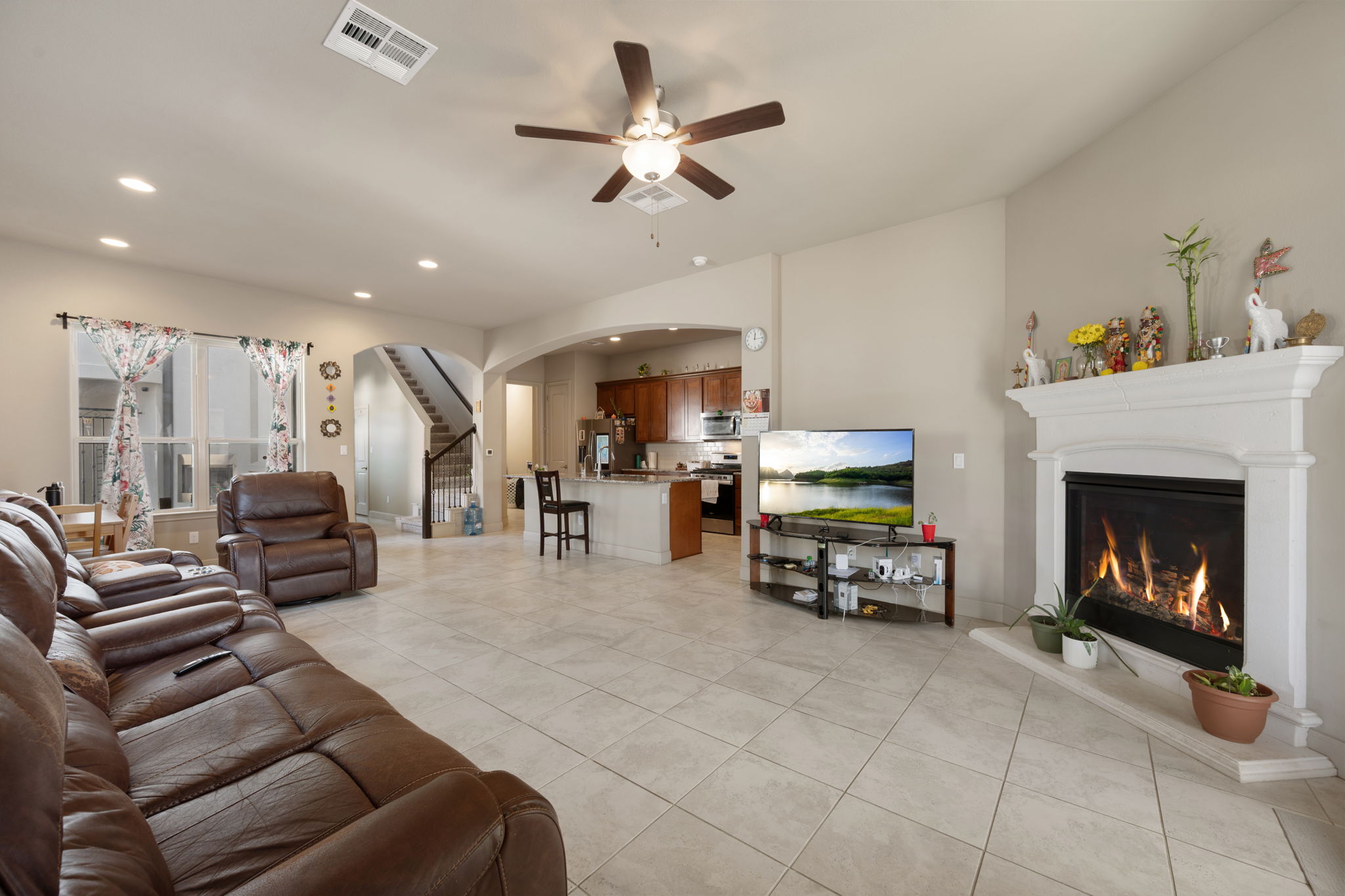 205 Clubhouse Drive, Unit G Georgetown, TX 78628 - Photo 4 of 40 a living room with furniture and a fireplace