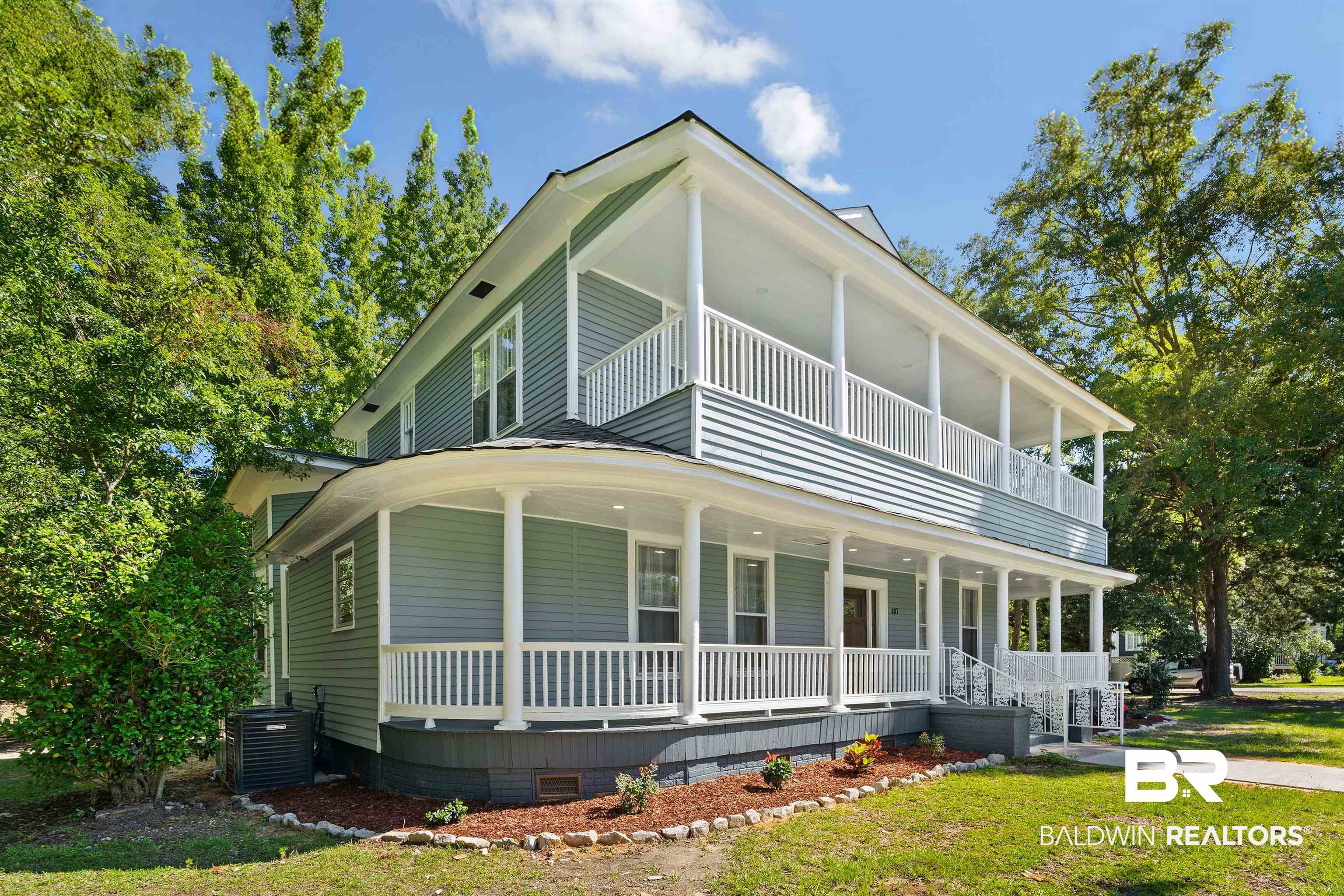 407 East 2nd Street Bay Minette, AL 36507 - Photo 2 of 40 Country-style home featuring crawl space, a large porch, and a front yard