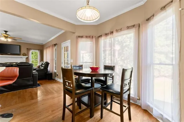 a bedroom with a bed and a dresser in it