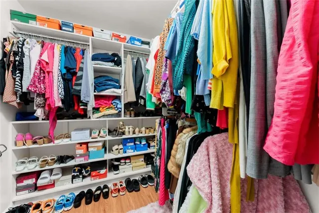 a room with a table and a chandelier