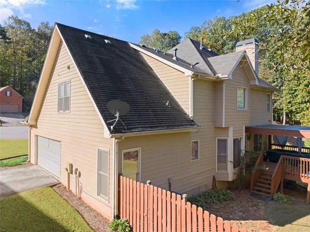 an aerial view of a city with lots of residential buildings