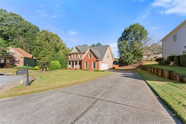 a view of a street with houses on both side of it