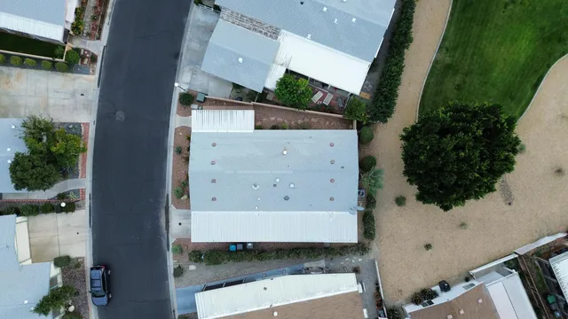 an aerial view of residential house with outdoor space