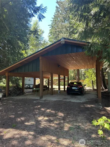 a view of yard with car parked