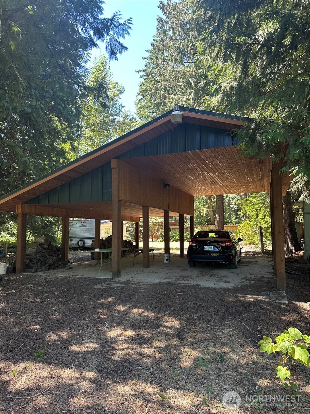a view of yard with car parked