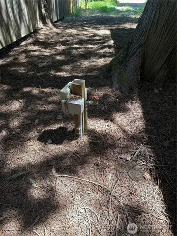 a view of a backyard of a house
